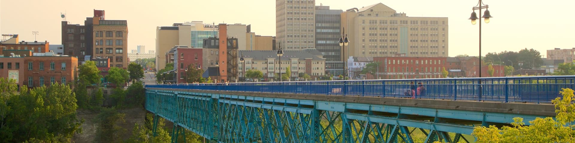 Pont de Rennes Bridge showing a city, a sunset and a bridge