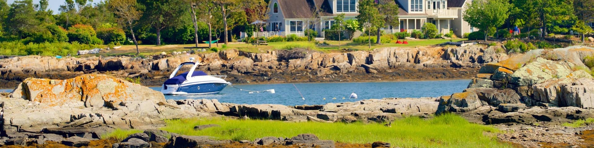 Bailey Island featuring rugged coastline and a house