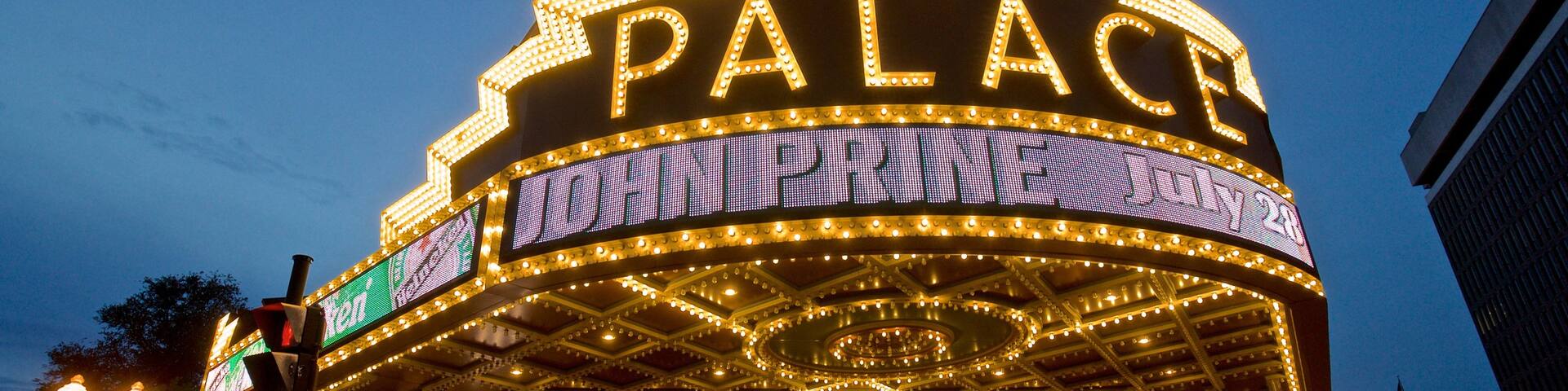 Palace Theater which includes signage, night scenes and heritage architecture