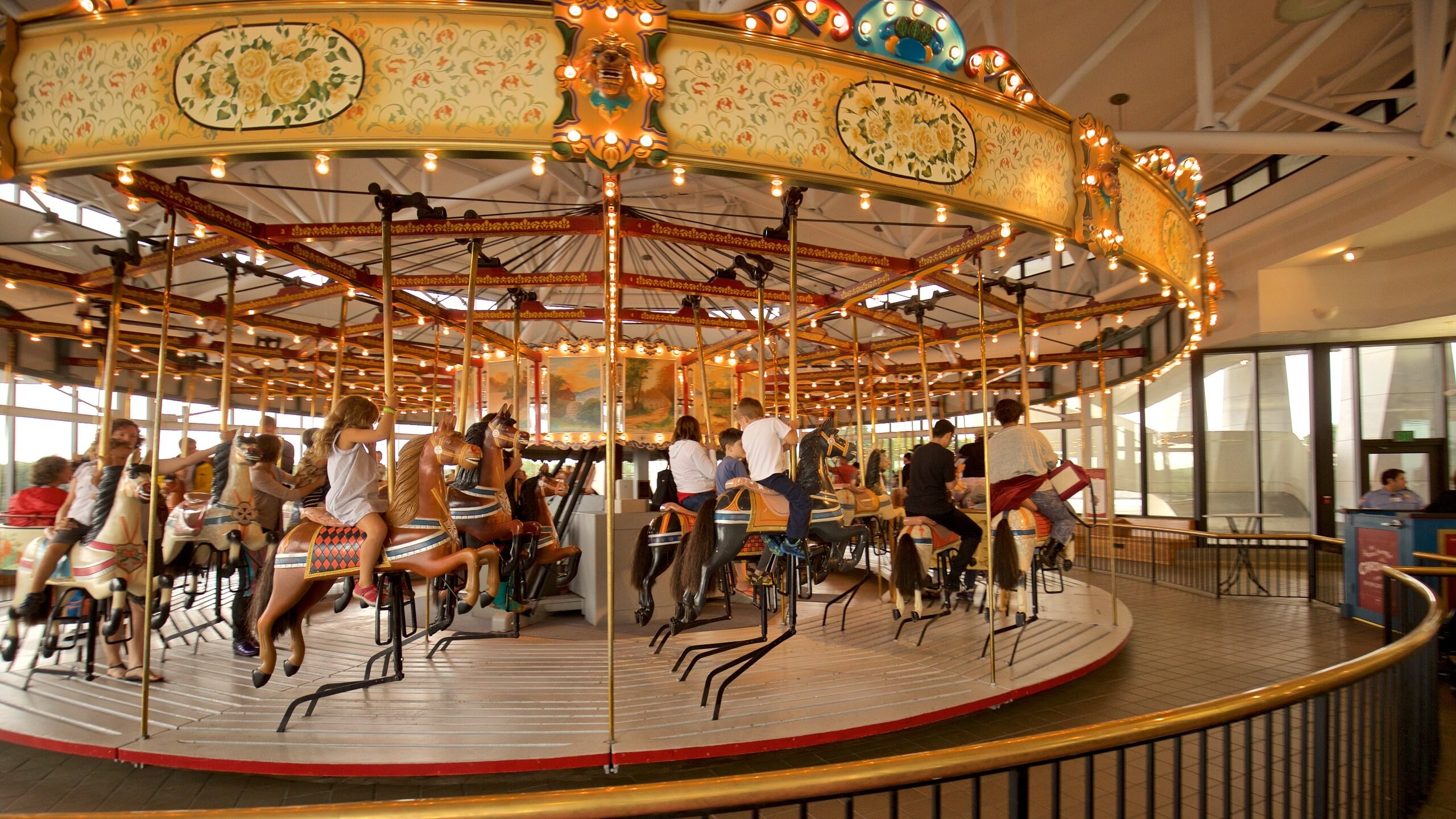 New York State Museum featuring rides as well as children