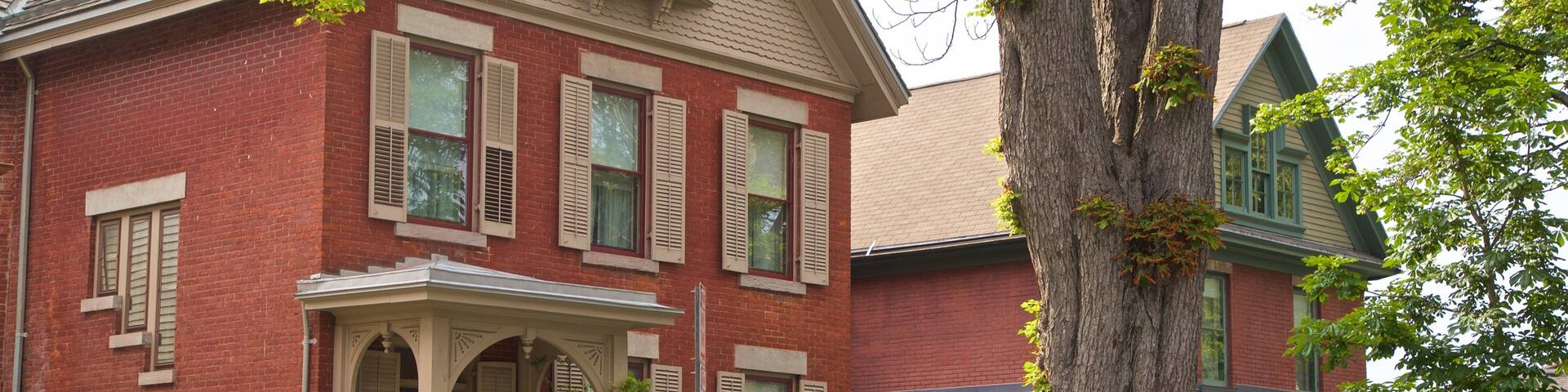 Susan B. Anthony House which includes a house and a small town or village