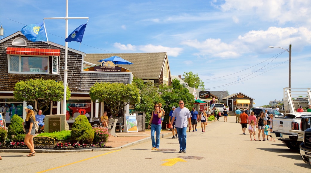 Perkins Cove featuring street scenes and a small town or village as well as a small group of people