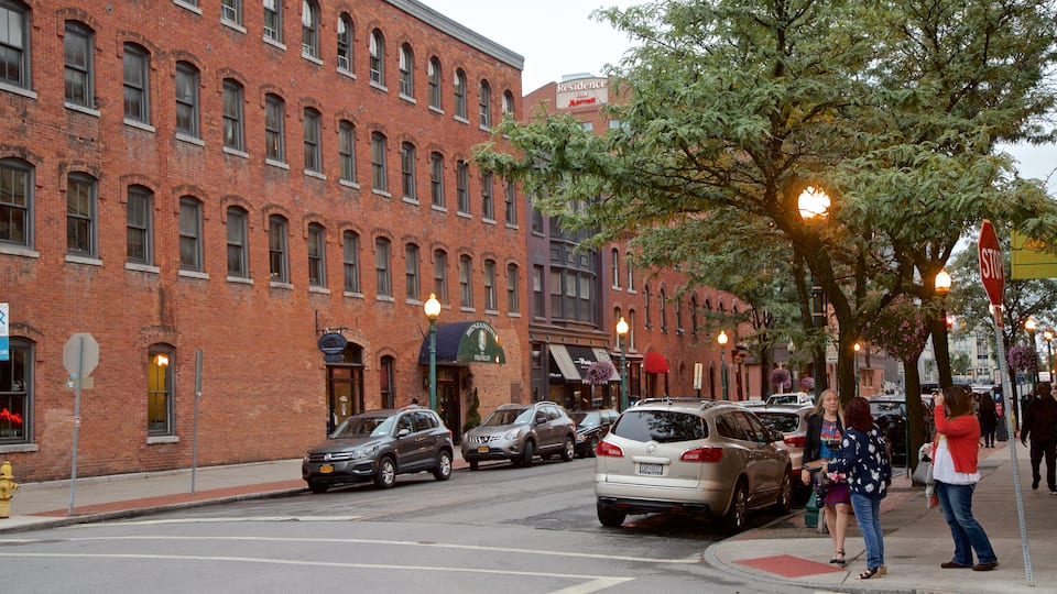 Armory Square showing a city and street scenes as well as a small group of people