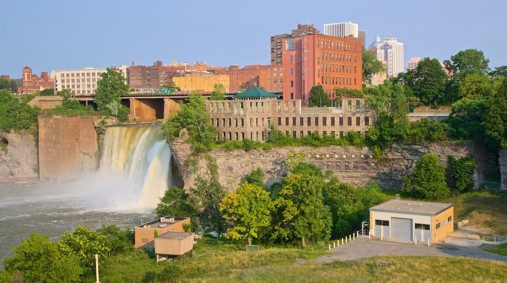 Genesee River\'s High Falls showing a cascade and a city