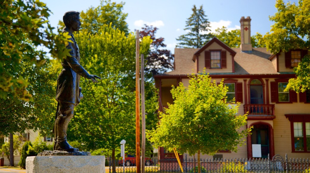 Skolfield-Whittier House featuring a house and a statue or sculpture