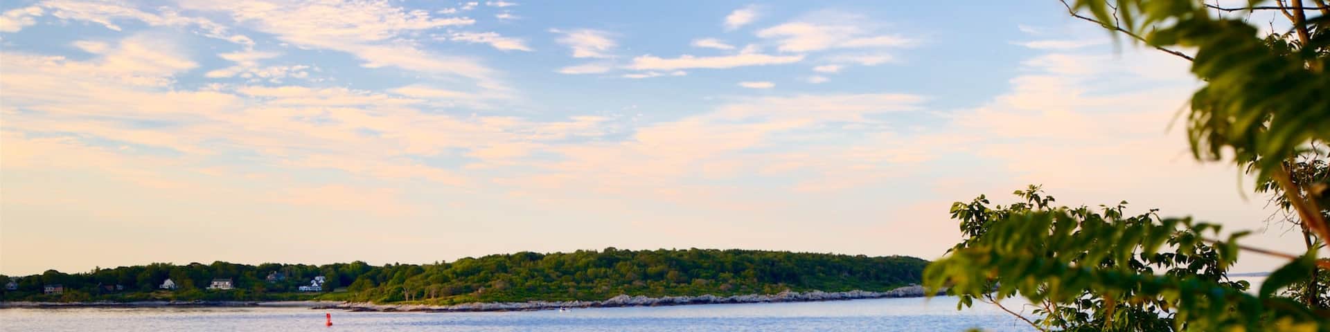 Fort Williams Park which includes boating, a sunset and a lake or waterhole