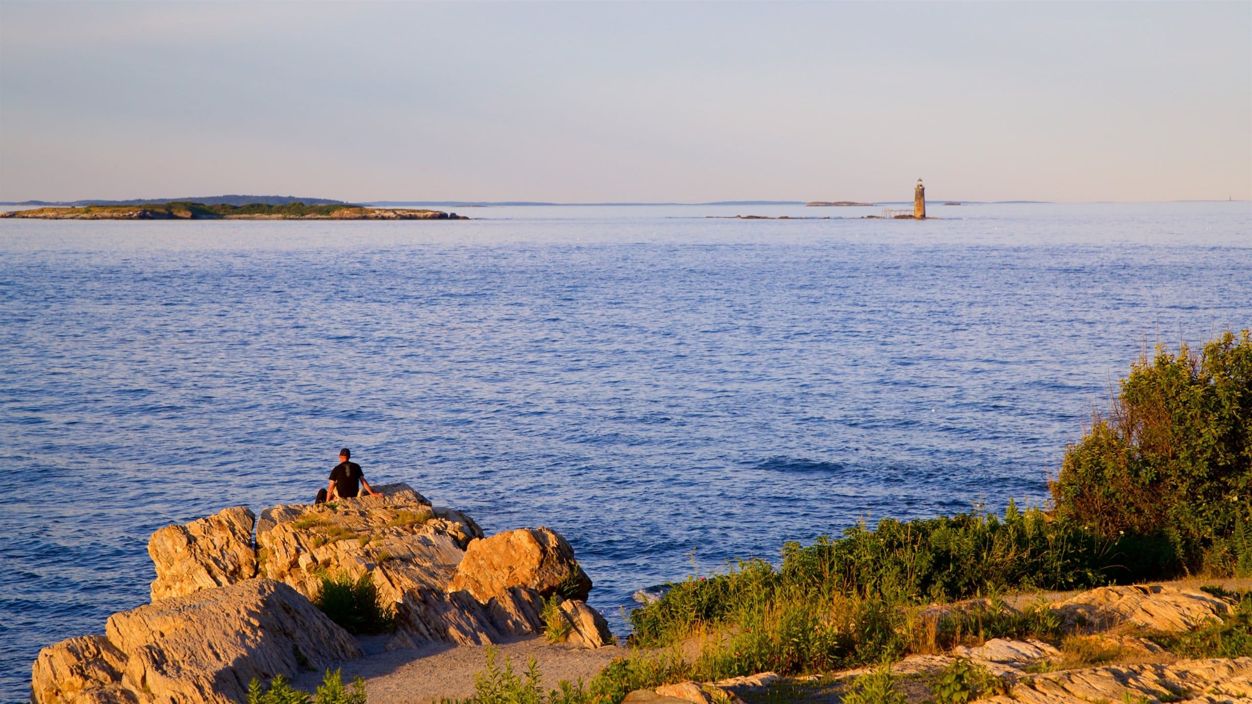 Fort Williams Park which includes rugged coastline, general coastal views and a sunset