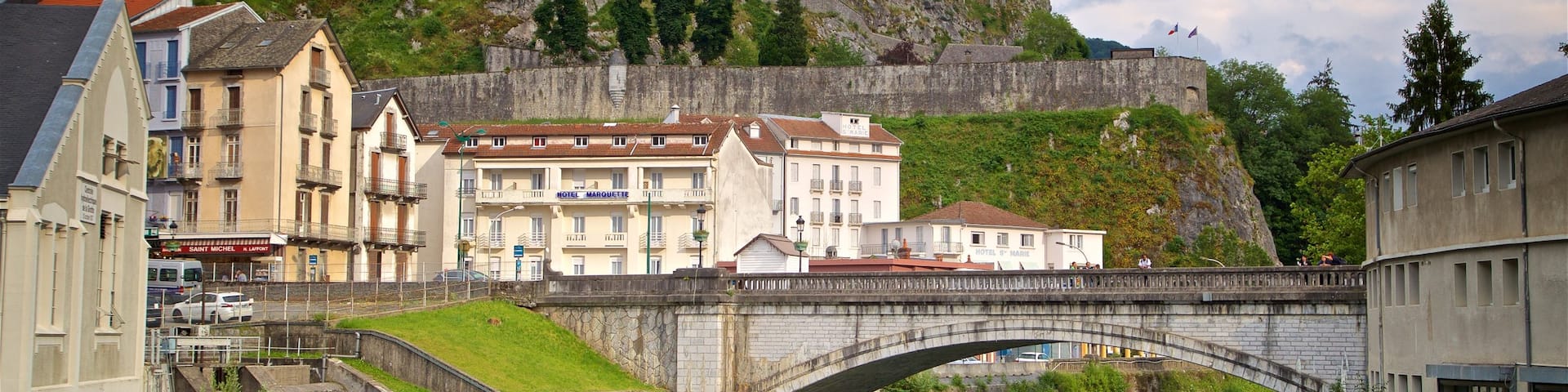 Chateau Fort Pyreneen Museum showing heritage architecture, a river or creek and a bridge