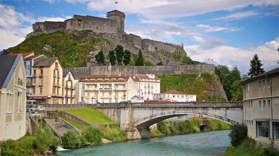 Chateau Fort Pyreneen Museum featuring heritage architecture, a bridge and a river or creek
