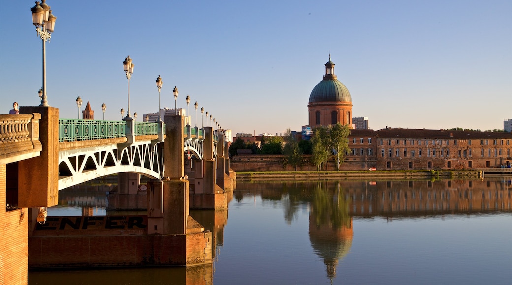 Garonne featuring a river or creek, heritage architecture and a sunset