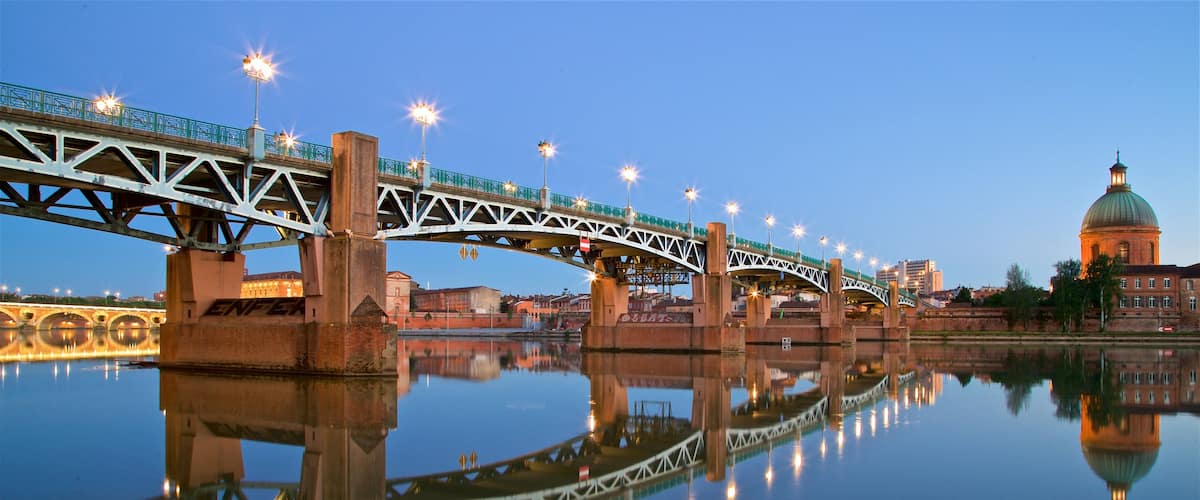 Garonne which includes heritage architecture, a river or creek and night scenes