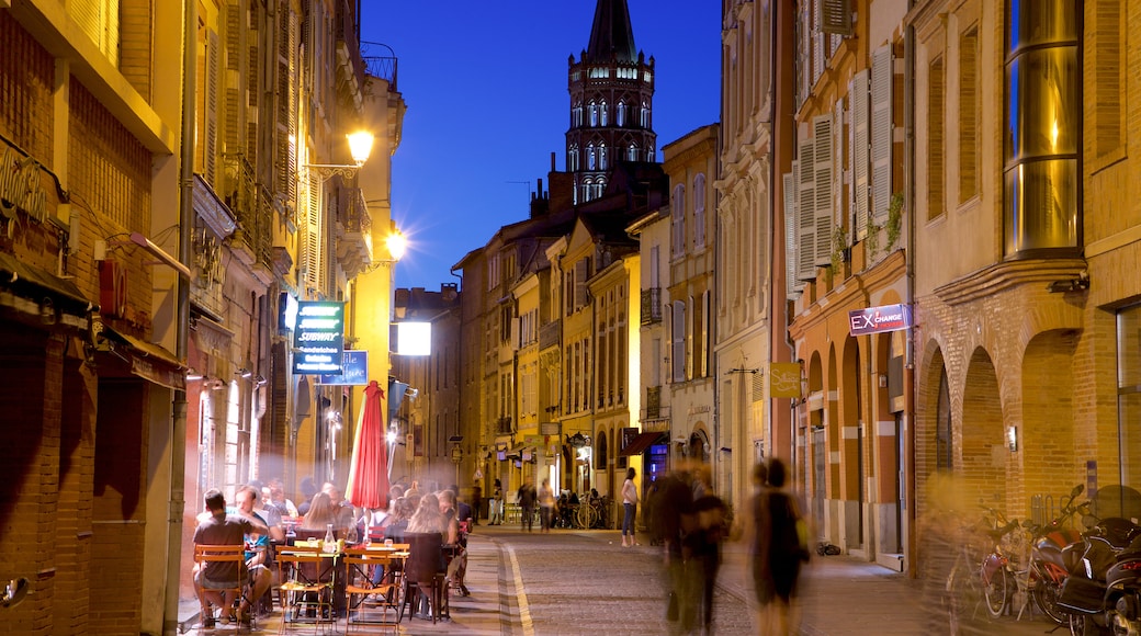 Toulouse which includes night scenes, a city and street scenes