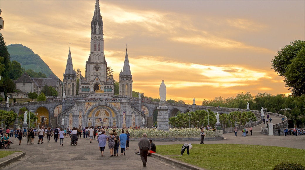 Lourdes - Tarbes which includes a sunset, a church or cathedral and heritage architecture