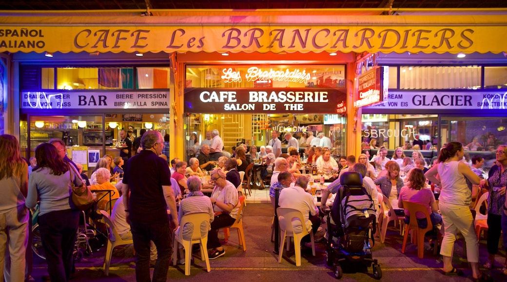 Lourdes - Tarbes montrant scĂšnes de nuit, signalisation et sortie au restaurant