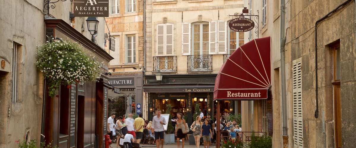 Beaune showing a city and street scenes as well as a small group of people