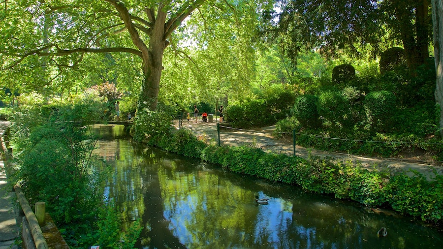Jardin des Plantes featuring a garden and a river or creek