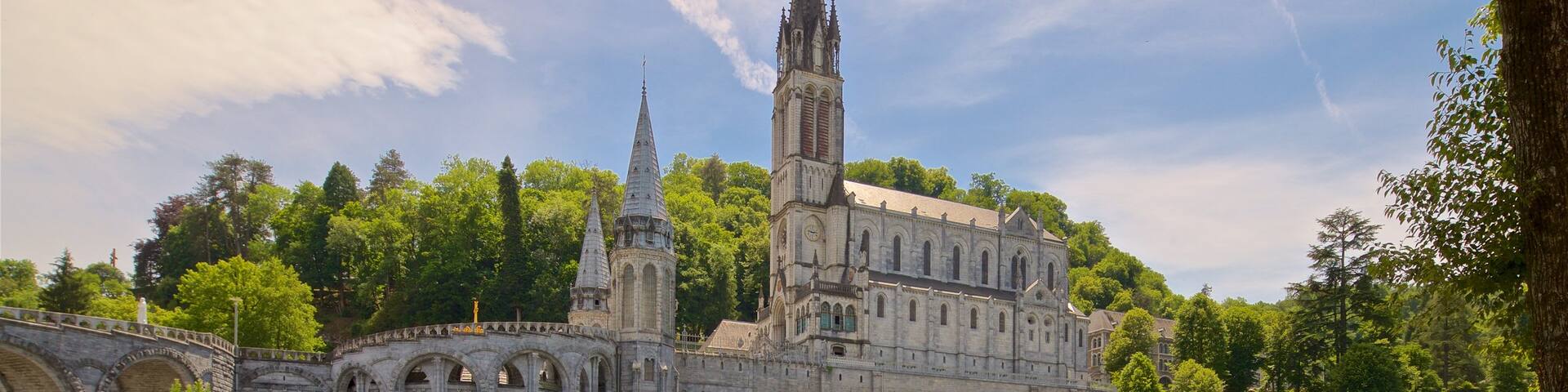 Notre-Dame de l\'Immaculee-Conception showing heritage architecture, a church or cathedral and a river or creek