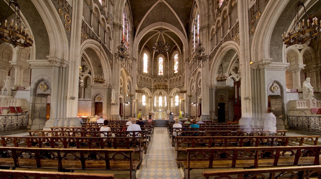 Notre-Dame de l\'Immaculee-Conception which includes heritage elements, a church or cathedral and interior views