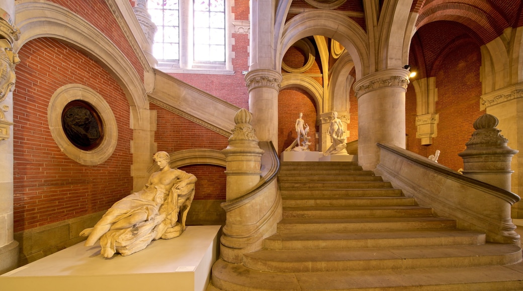 Museum of the Augustins showing heritage elements, a statue or sculpture and interior views