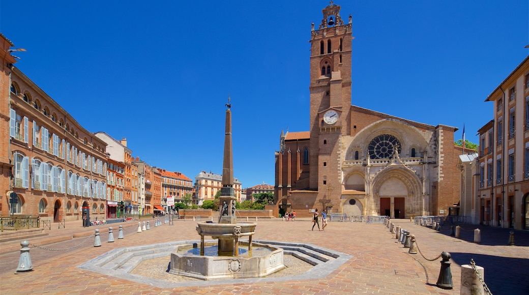 Saint Etienne Cathedrale featuring a fountain, a church or cathedral and heritage architecture