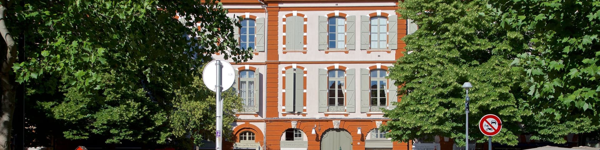 Saint George Place showing street scenes as well as a small group of people