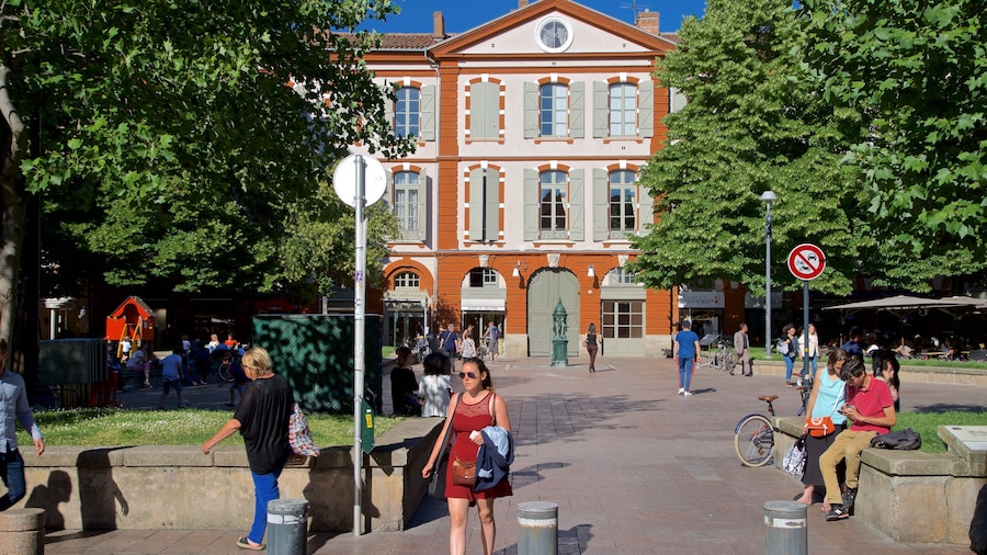 Saint George Place showing street scenes as well as a small group of people