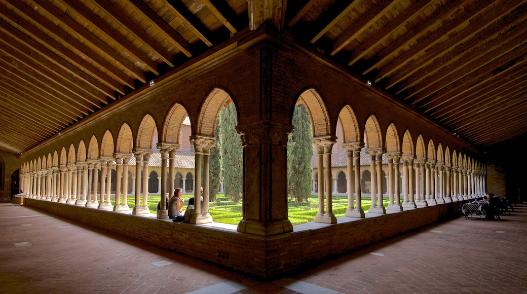 Church of the Jacobins showing interior views and a park as well as a couple