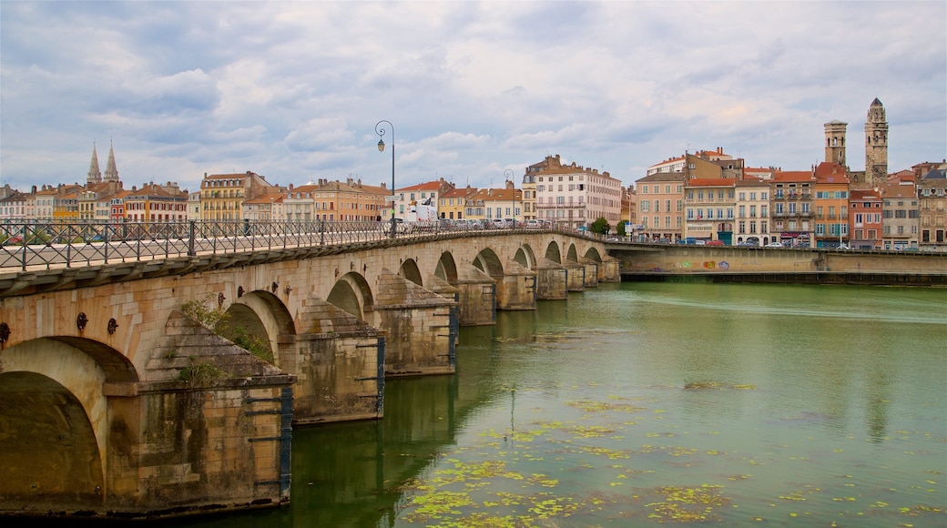 Pont Saint-Laurent featuring a bridge, a river or creek and a city