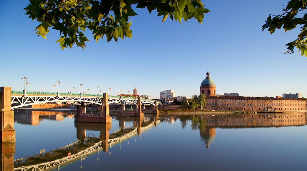 Garonne featuring a river or creek, a sunset and heritage architecture