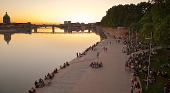 Garonne featuring a river or creek, a sunset and a garden