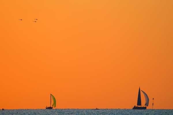 Noumea which includes sailing, a sunset and general coastal views