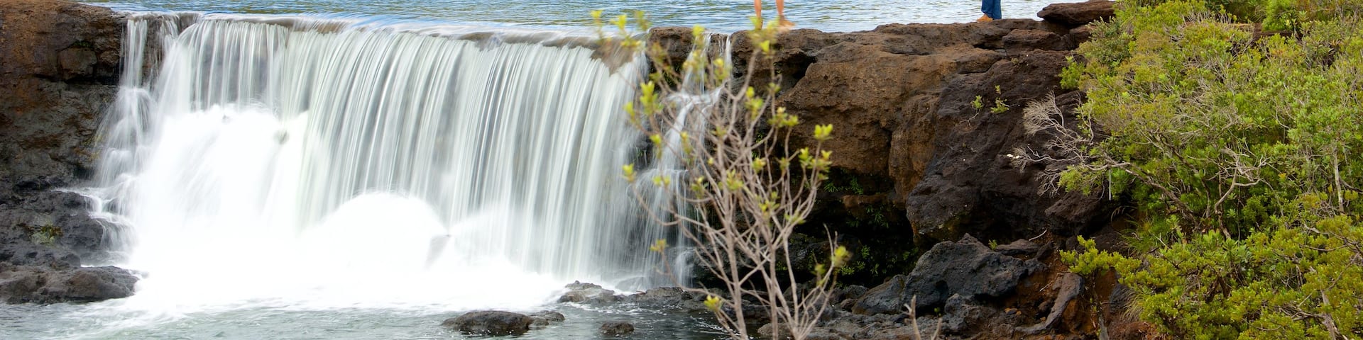 Yate featuring a river or creek as well as a small group of people