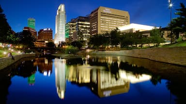 Omaha featuring a high rise building, night scenes and a river or creek