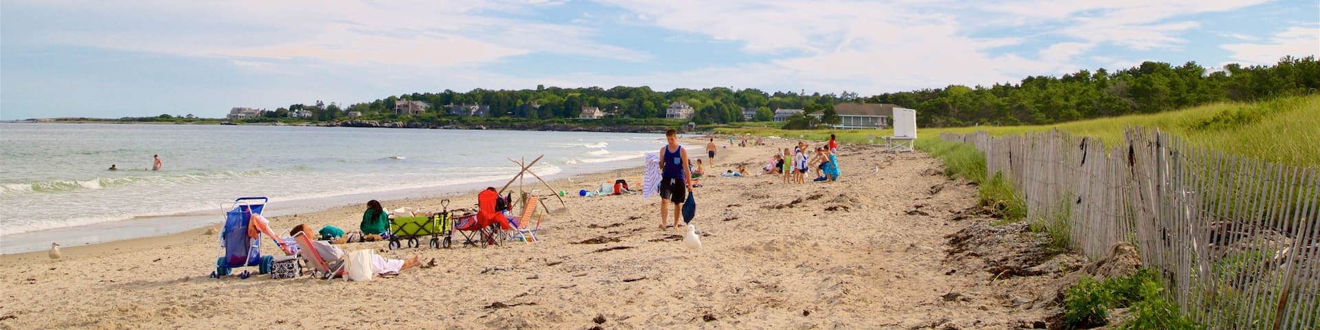Scarborough Beach State Park showing general coastal views and a sandy beach as well as a small group of people