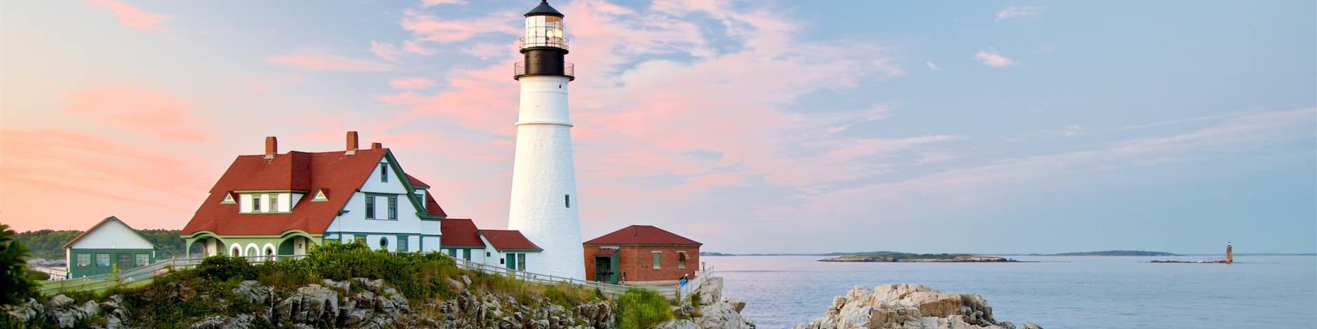 Portland Head Light which includes a lighthouse, general coastal views and rocky coastline