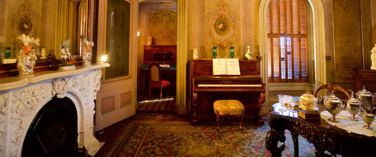 Victoria Mansion featuring a house, heritage elements and interior views