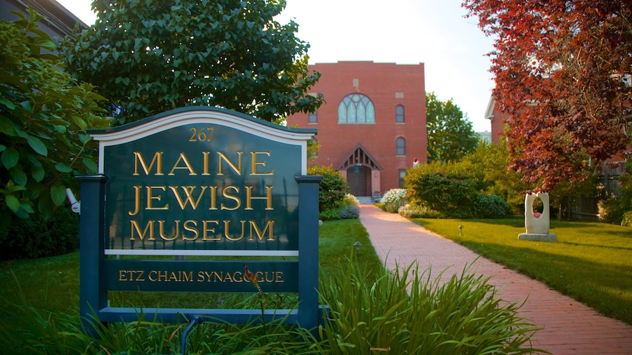 Maine Jewish Museum featuring signage and a garden