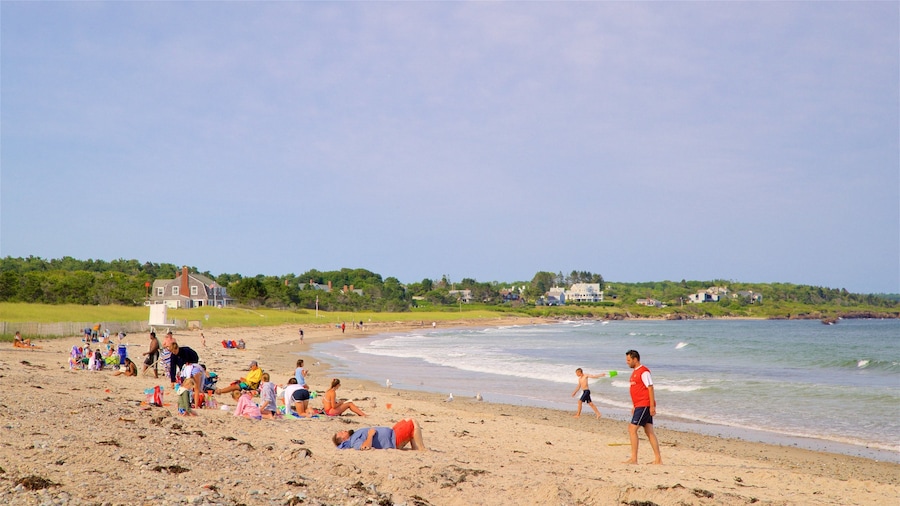 Scarborough Beach State Park featuring general coastal views and a sandy beach as well as a small group of people