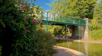 Jardin Lecoq featuring a river or creek and a bridge