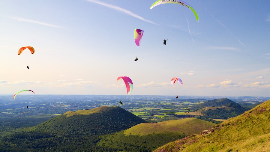 Puy de Dome which includes parachuting, tranquil scenes and landscape views