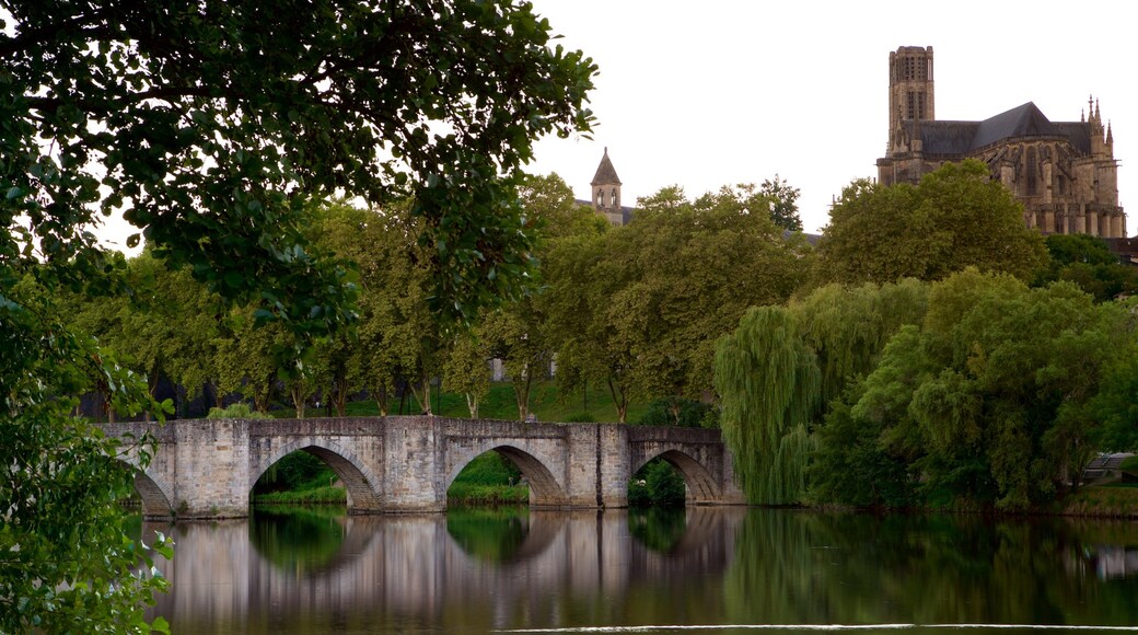 Limoges showing a bridge, a river or creek and heritage architecture