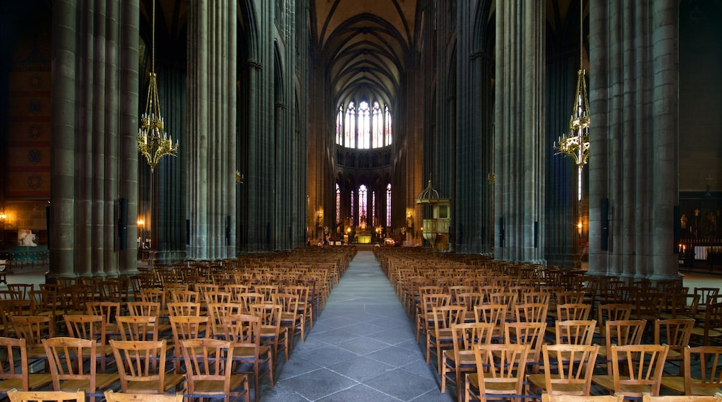 Clermont-Ferrand Cathedral showing a church or cathedral, heritage elements and interior views