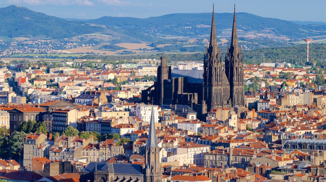 Montjuzet Park which includes heritage architecture, a city and a church or cathedral