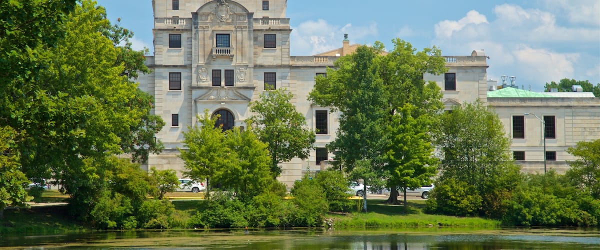 Iowa State University featuring a lake or waterhole and heritage architecture