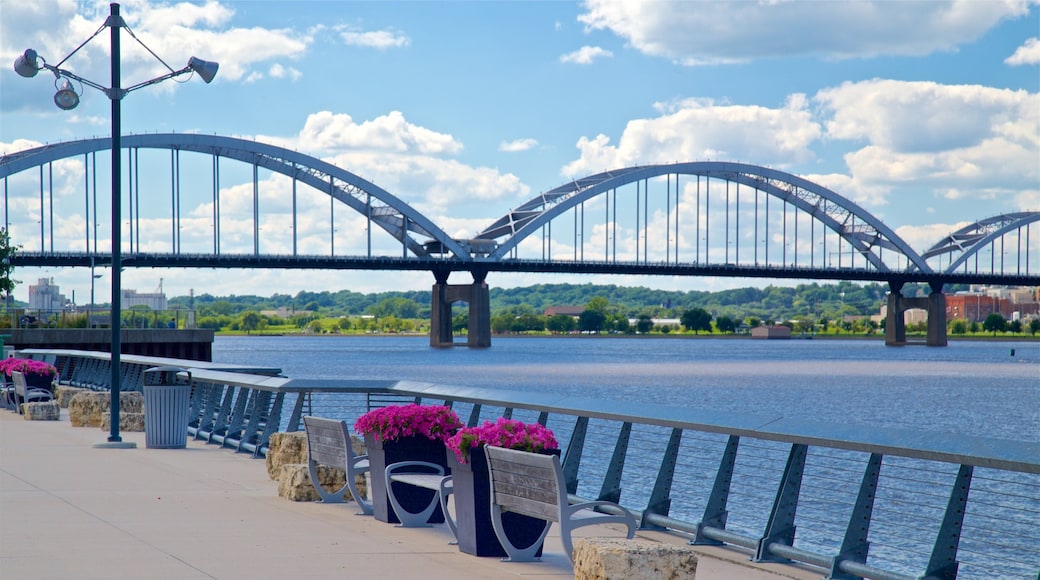 Davenport featuring a bridge, flowers and a river or creek