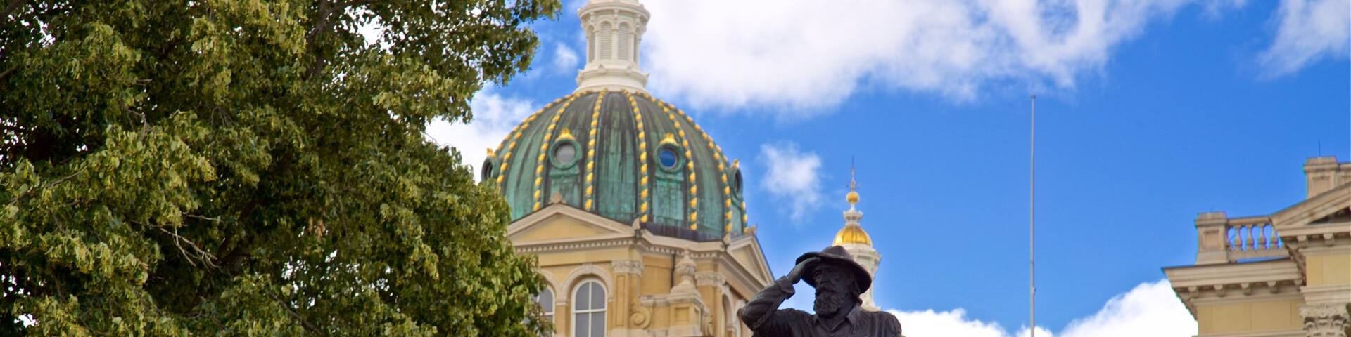 Iowa State Capitol Building which includes a statue or sculpture