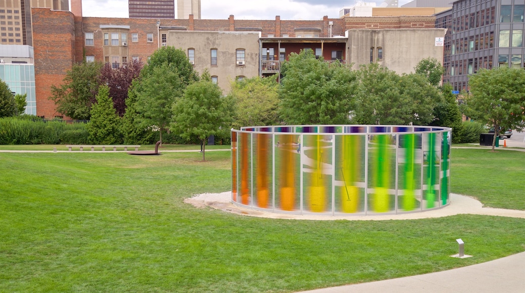 John and Mary Pappajohn Sculpture Park featuring a garden, outdoor art and a city