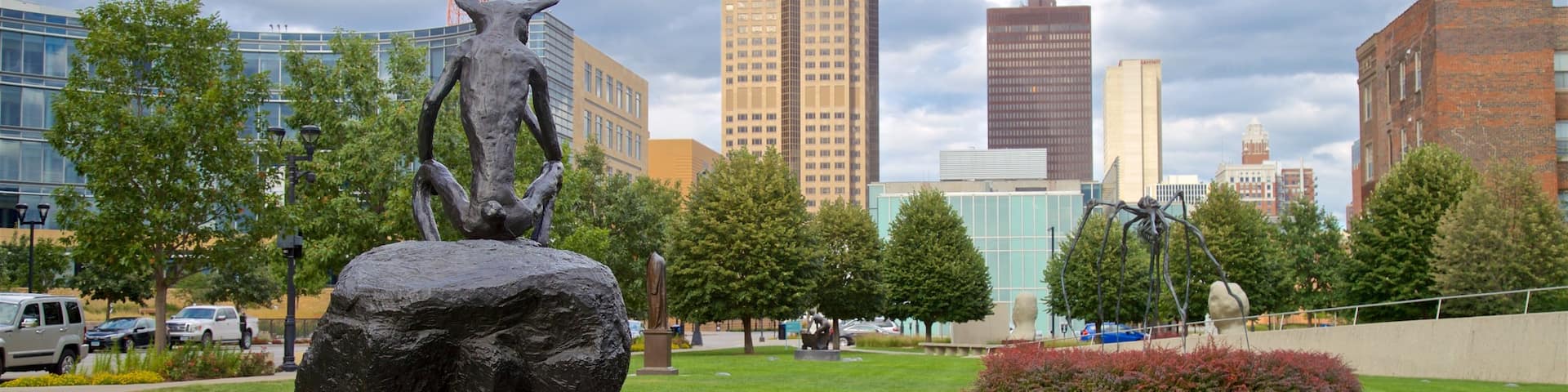 John and Mary Pappajohn Sculpture Park featuring outdoor art, a city and a park