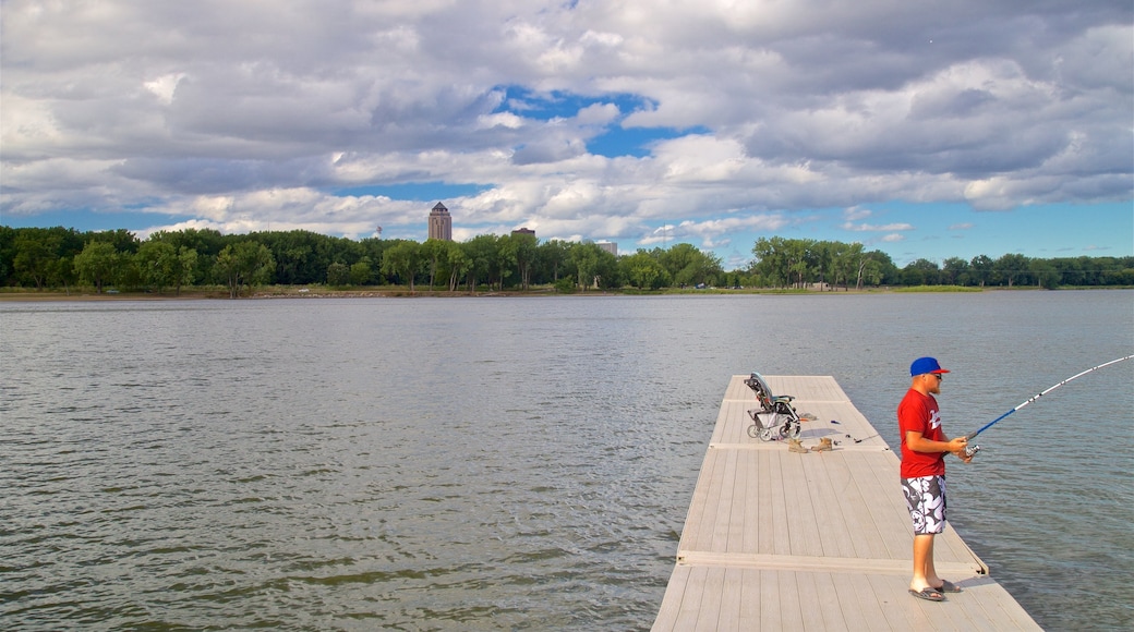 Grays Lake featuring a lake or waterhole and fishing as well as an individual male