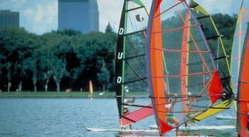 Lake Calhoun showing windsurfing, landscape views and a sporting event